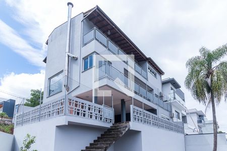 Casa de condomínio para alugar com 423m², 4 quartos e 4 vagas Casa de condomínio para alugar com 423m², 4 quartos e 4 vagasFachada