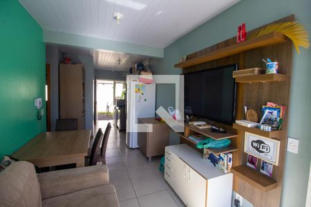 Sala de casa de condomínio à venda com 2 quartos, 48m² em Feitoria, São Leopoldo