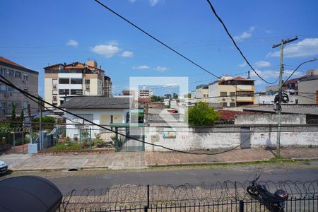 Sala - Vista de apartamento à venda com 2 quartos, 57m² em São Sebastião, Porto Alegre