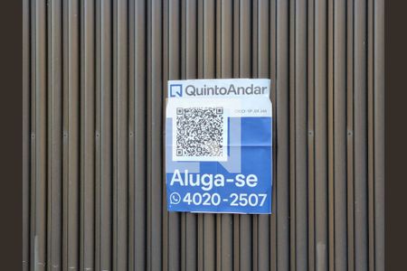 Casa à venda com 300m², 3 quartos e 2 vagasPlaquinha instalada no portão do imóvel