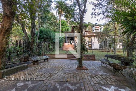 Casa de condomínio à venda com 475m², 5 quartos e 6 vagas