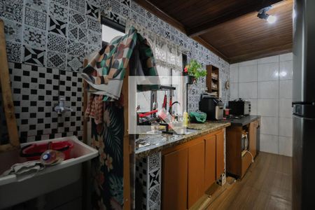 Casa à venda com 166m², 3 quartos e sem vaga Casa à venda com 166m², 3 quartos e sem vagaCozinha e Área de Serviço