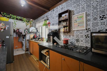 Casa à venda com 166m², 3 quartos e sem vaga Casa à venda com 166m², 3 quartos e sem vagaCozinha e Área de Serviço