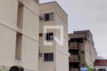 Apartamento à venda com 130m², 2 quartos e 2 vagasFachada com cartaz QA.