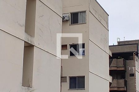 Apartamento à venda com 130m², 2 quartos e 2 vagasFachada com cartaz QA.