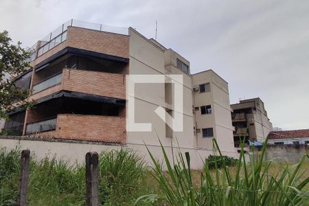 Apartamento à venda com 130m², 2 quartos e 2 vagasFachada com cartaz QA.