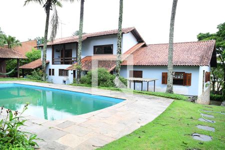 Casa de condomínio para alugar com 450m², 7 quartos e 4 vagasFundos