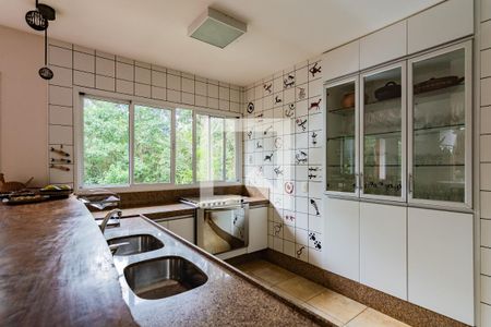 Casa de condomínio à venda com 400m², 4 quartos e 3 vagas Casa de condomínio à venda com 400m², 4 quartos e 3 vagasCozinha Americana