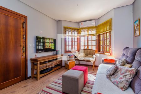 Sala de casa à venda com 3 quartos, 147m² em Guarujá, Porto Alegre
