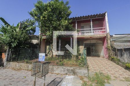 Fachada de casa à venda com 3 quartos, 180m² em Sarandi, Porto Alegre
