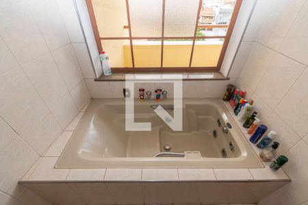 Casa à venda com 419m², 4 quartos e 4 vagasBanheira Banheiro da Suíte 1