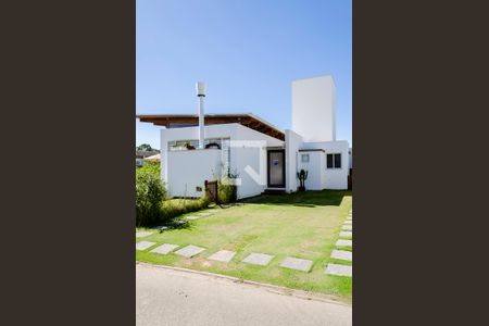 Casa de condomínio para alugar com 375m², 4 quartos e 4 vagas Casa de condomínio para alugar com 375m², 4 quartos e 4 vagasFachada / Plaquinha