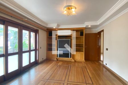 Casa de condomínio para alugar com 954m², 4 quartos e 8 vagasSala de TV