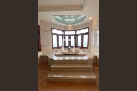 Casa de condomínio para alugar com 954m², 4 quartos e 8 vagasBanheiro da Suíte 1