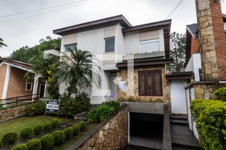 Casa de condomínio para alugar com 283m², 4 quartos e 4 vagas Casa de condomínio para alugar com 283m², 4 quartos e 4 vagasVista da Rua