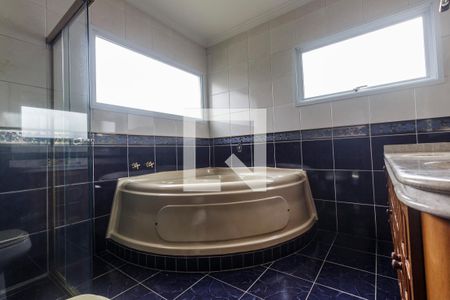 Casa de condomínio para alugar com 283m², 4 quartos e 4 vagas Casa de condomínio para alugar com 283m², 4 quartos e 4 vagasBanheiro da Suíte 1