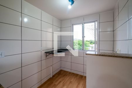 Cozinha e Área de Serviço de apartamento à venda com 2 quartos, 44m² em Vila Nova, Porto Alegre