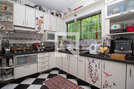 Casa à venda com 125m², 3 quartos e 3 vagas Casa à venda com 125m², 3 quartos e 3 vagasCozinha 2