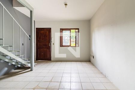 Sala de casa de condomínio à venda com 1 quarto, 100m² em Campo Novo, Porto Alegre
