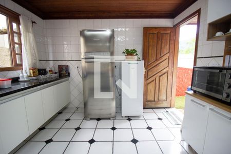 Casa de condomínio à venda com 460m², 4 quartos e 2 vagas Casa de condomínio à venda com 460m², 4 quartos e 2 vagasCozinha e Área de Serviço