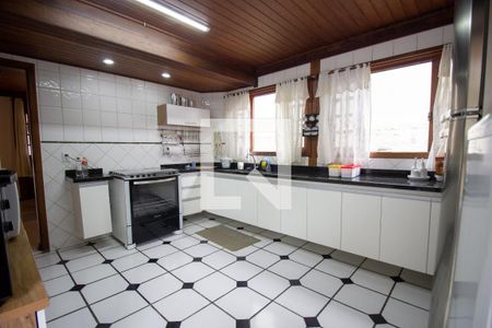 Casa de condomínio à venda com 460m², 4 quartos e 2 vagas Casa de condomínio à venda com 460m², 4 quartos e 2 vagasCozinha e Área de Serviço