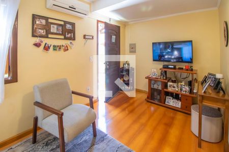 Sala de casa de condomínio à venda com 3 quartos, 103m² em Vila Nova, Porto Alegre