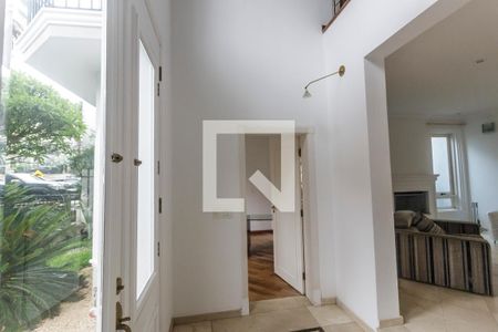 Casa de condomínio à venda com 516m², 5 quartos e 7 vagas Casa de condomínio à venda com 516m², 5 quartos e 7 vagasHall de entrada