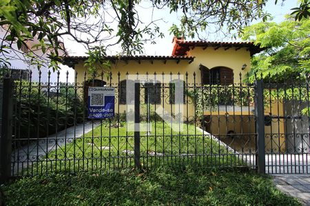 Casa à venda com 300m², 5 quartos e 3 vagasFachada do imóvel Plaquinha QuintoAndar