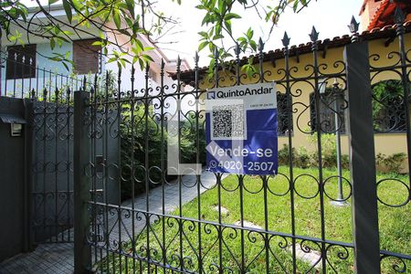 Casa à venda com 300m², 5 quartos e 3 vagasFachada do imóvel Plaquinha QuintoAndar