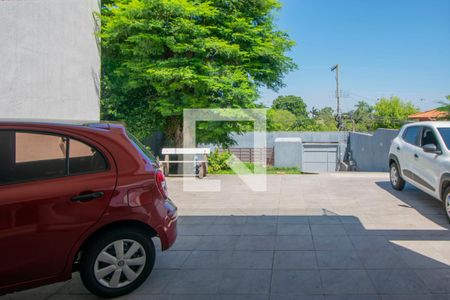 Garagem de casa à venda com 4 quartos, 400m² em Guarujá, Porto Alegre