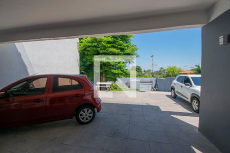 Garagem de casa à venda com 4 quartos, 400m² em Guarujá, Porto Alegre