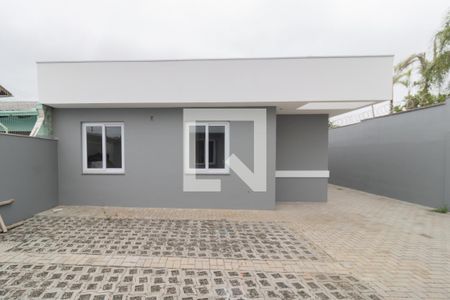 Sala/Cozinha-Vista de casa de condomínio à venda com 2 quartos, 49m² em Niterói, Canoas