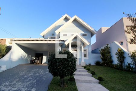 Casa de condomínio para alugar com 270m², 4 quartos e 4 vagasFachada da casa