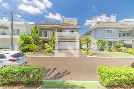 Casa de condomínio à venda com 429m², 5 quartos e 2 vagas Casa de condomínio à venda com 429m², 5 quartos e 2 vagasFachada