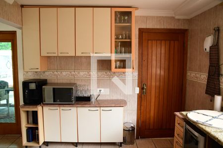 Casa de condomínio para alugar com 379m², 4 quartos e 4 vagasCozinha