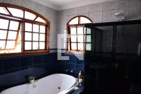 Casa de condomínio para alugar com 379m², 4 quartos e 4 vagasBanheiro da Suíte