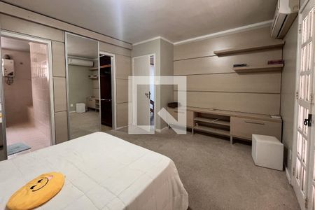 Suíte de casa de condomínio à venda com 4 quartos, 300m² em Espírito Santo, Porto Alegre