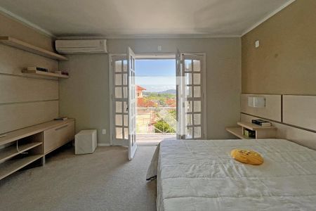 Casa de condomínio à venda com 300m², 4 quartos e 2 vagasVista para o Guaiba da Suíte