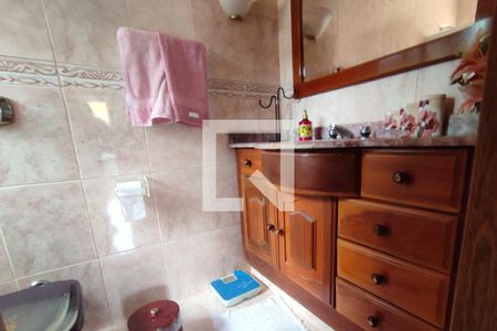 Casa de condomínio à venda com 282m², 3 quartos e 3 vagas Casa de condomínio à venda com 282m², 3 quartos e 3 vagasBanheiro da Suíte 1