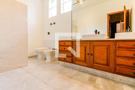 Casa à venda com 430m², 4 quartos e 4 vagasBanheiro Suíte 2