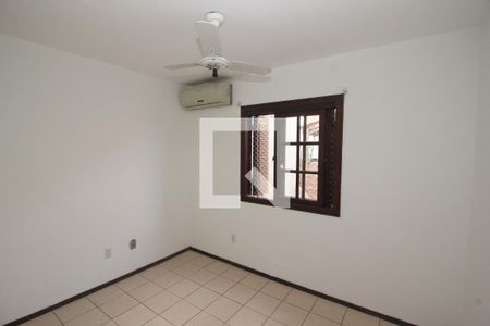 Quarto 1 de casa para alugar com 2 quartos, 67m² em Tristeza, Porto Alegre