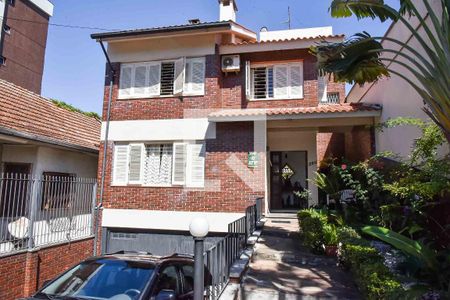 Casa à venda com 400m², 5 quartos e 4 vagasFachada da Casa e Jardim