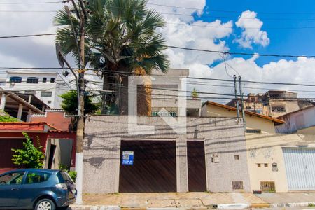 Casa à venda com 305m², 5 quartos e 5 vagasFachada - Placa Quinto Andar