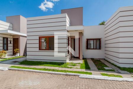 Casa de condomínio à venda com 72m², 2 quartos e 1 vagaFachada da casa