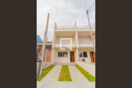 Casa de condomínio à venda com 130m², 3 quartos e 1 vaga Casa de condomínio à venda com 130m², 3 quartos e 1 vagaFachada