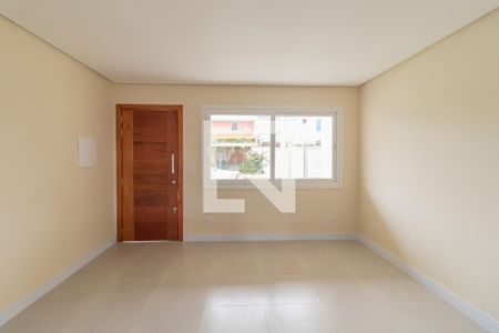 Sala de casa de condomínio à venda com 3 quartos, 130m² em Hípica, Porto Alegre