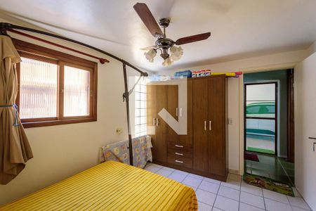 Suíte 1 de casa à venda com 4 quartos, 400m² em Campo Novo, Porto Alegre