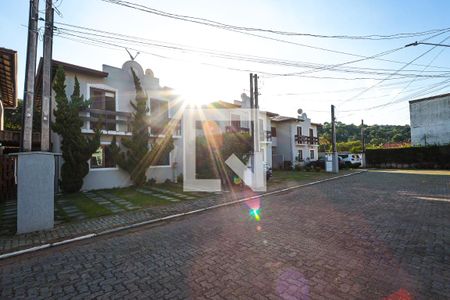 Casa de condomínio para alugar com 75m², 2 quartos e 2 vagas Casa de condomínio para alugar com 75m², 2 quartos e 2 vagasFachada da casa / rua