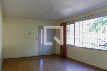Sala de estar de casa à venda com 6 quartos, 360m² em Três Figueiras, Porto Alegre