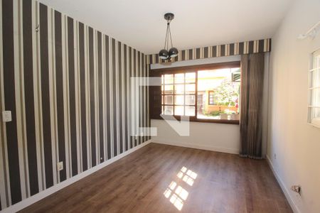 Sala de casa de condomínio à venda com 3 quartos, 165m² em Medianeira, Porto Alegre